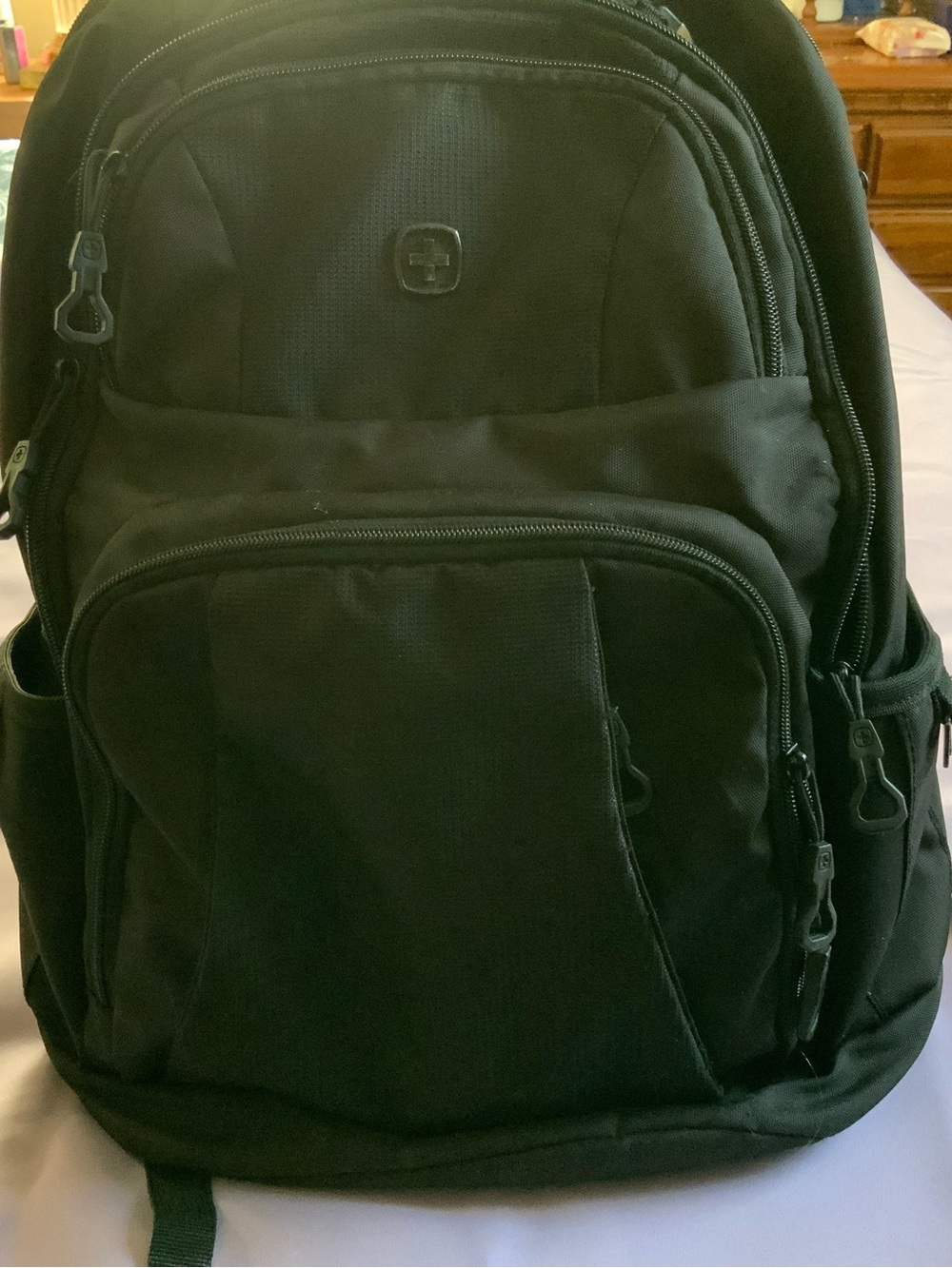 Durable Black Travel & Work Backpack with Multiple Pockets